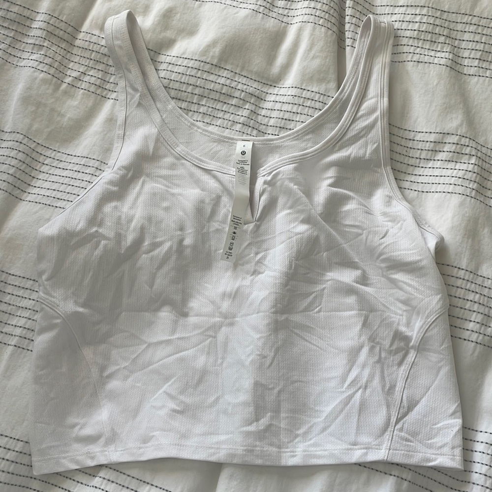 Never worn cropped white lululemon tank top